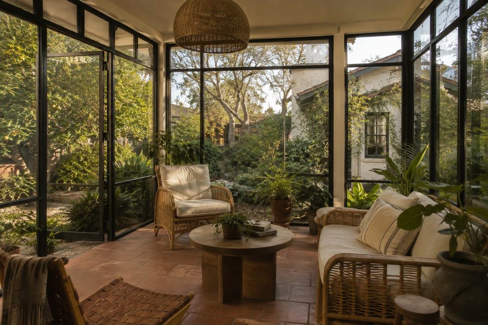 Sunroom addition with large windows
