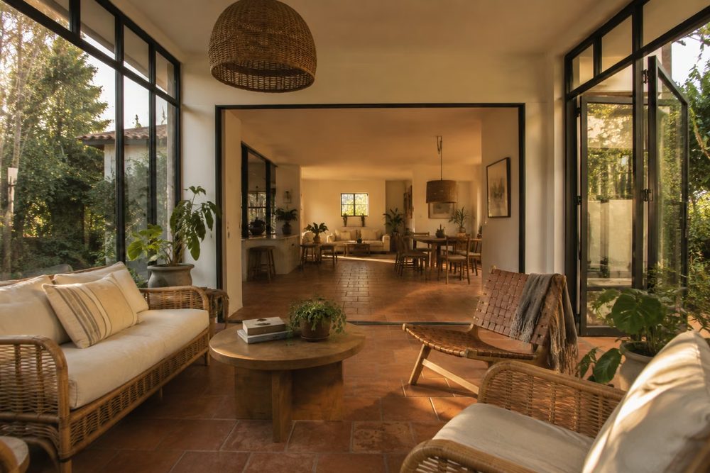 Bright sunroom addition with garden views